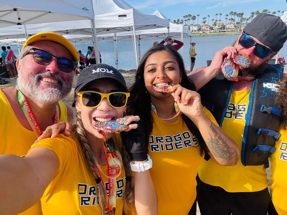Hosts and guests taking a selfie at a race-day event